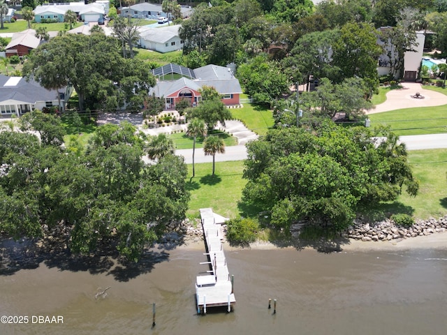 2667 John Anderson Dr, Ormond Beach, FL 32176 - aerial view of residential area with a nearby body of water and a tree filled landscape