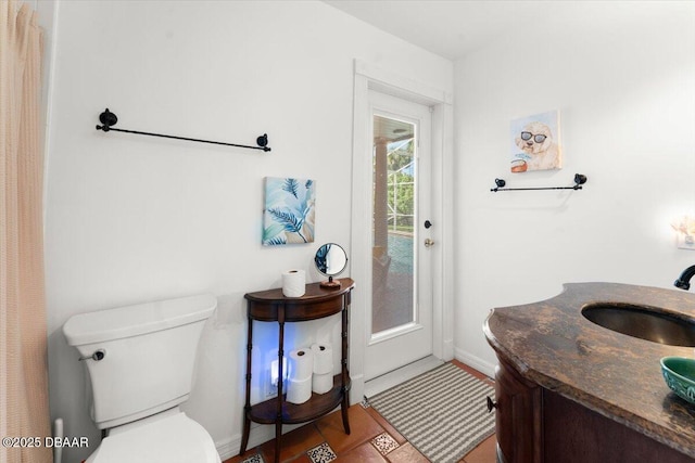 2667 John Anderson Dr, Ormond Beach, FL 32176 - bathroom with toilet and vanity
