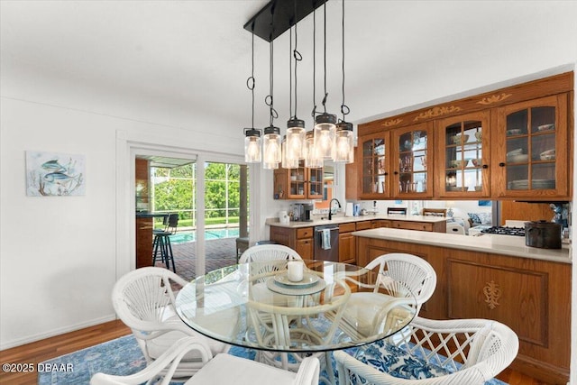 2667 John Anderson Dr, Ormond Beach, FL 32176 - dining room with wood finished floors and baseboards