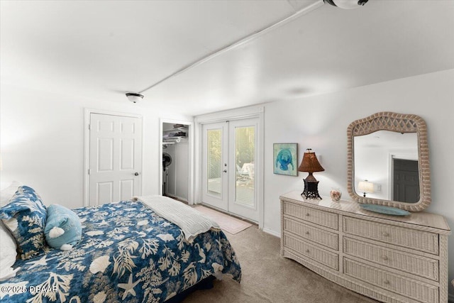 2667 John Anderson Dr, Ormond Beach, FL 32176 - bedroom featuring access to exterior, carpet, and french doors