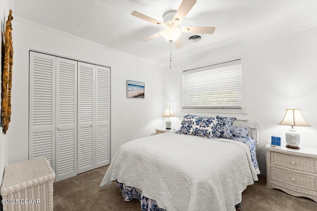 2667 John Anderson Dr, Ormond Beach, FL 32176 - bedroom with carpet floors, a closet, crown molding, and ceiling fan