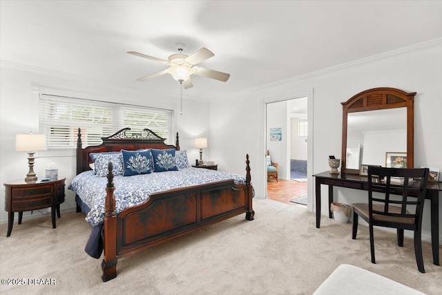 2667 John Anderson Dr, Ormond Beach, FL 32176 - bedroom with light colored carpet, crown molding, and ceiling fan
