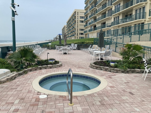 4555 S Atlantic Ave Unit 4209, Ponce Inlet, FL 32127 - view of swimming pool with a hot tub