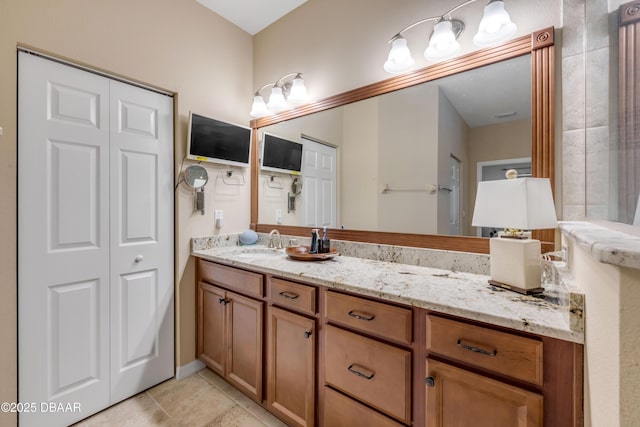 6 Promenade Pl, Palm Coast, FL 32164 - bathroom with vanity, tile patterned floors, and a closet