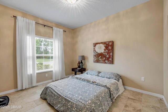 6 Promenade Pl, Palm Coast, FL 32164 - bedroom featuring baseboards