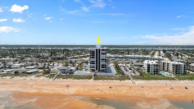 drone / aerial view with a view of the beach and a water view