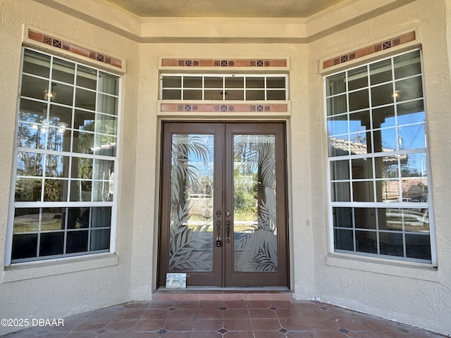 doorway to property with french doors