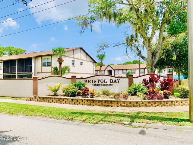 415 Banana Cay Dr Unit J, South Daytona, FL 32119 - view of community / neighborhood sign