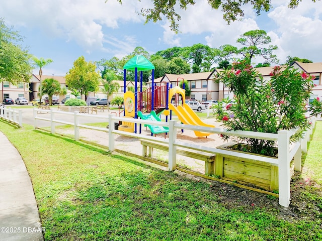 415 Banana Cay Dr Unit J, South Daytona, FL 32119 - communal playground with a residential view