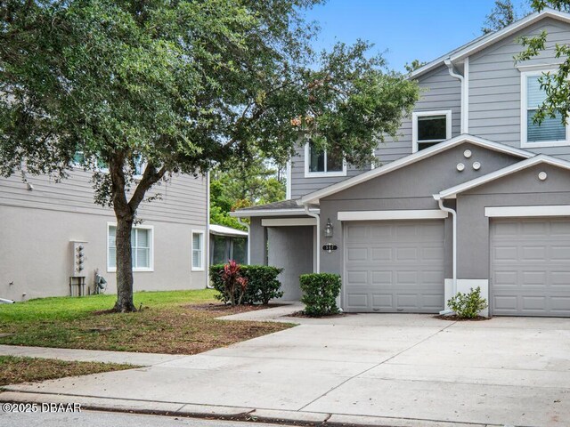 567 Mount Olympus Blvd, New Smyrna Beach, FL 32168 - view of front of property featuring driveway