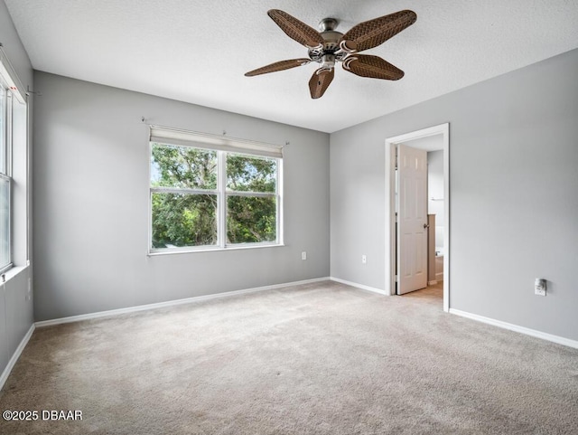 567 Mount Olympus Blvd, New Smyrna Beach, FL 32168 - empty room with carpet, a ceiling fan, and baseboards