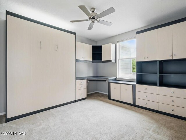 567 Mount Olympus Blvd, New Smyrna Beach, FL 32168 - unfurnished office featuring light carpet, ceiling fan, and baseboards