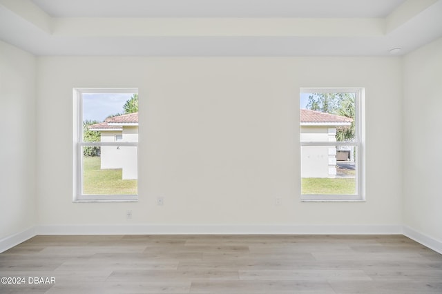 111 Bird Of Paradise Dr, Palm Coast, FL 32137 - spare room with light wood-type flooring and baseboards