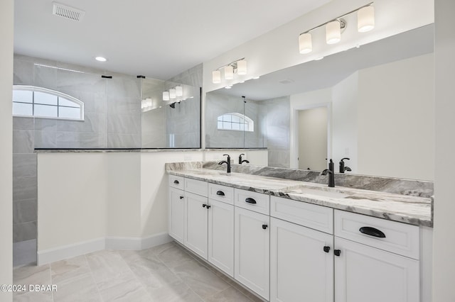 111 Bird Of Paradise Dr, Palm Coast, FL 32137 - full bathroom featuring double vanity, walk in shower, marble look tile flooring, and recessed lighting