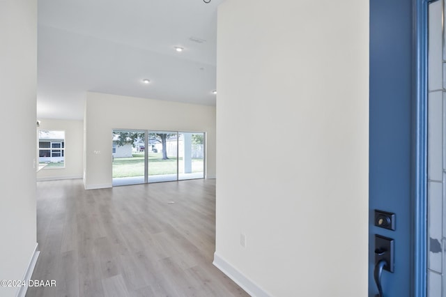 111 Bird Of Paradise Dr, Palm Coast, FL 32137 - hall featuring light wood-type flooring, baseboards, and recessed lighting
