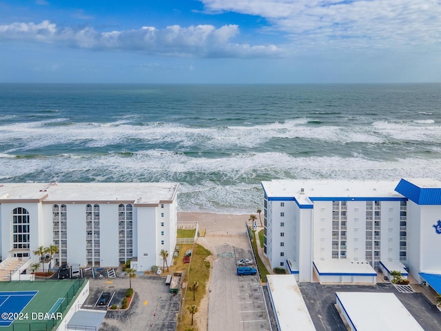 aerial view featuring a water view and a view of the beach