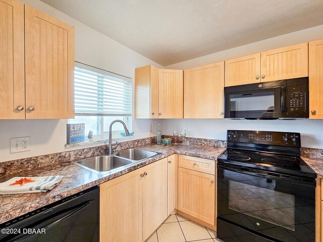 3606 S Peninsula Dr # 404, Port Orange, FL 32127 - kitchen featuring black appliances, light brown cabinetry, and light tile patterned floors