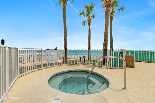 3145 S Atlantic Ave Unit 504, Daytona Beach Shores, FL 32118 - view of pool with a community hot tub and a water view