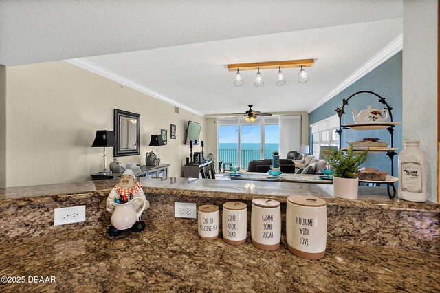 3145 S Atlantic Ave Unit 504, Daytona Beach Shores, FL 32118 - kitchen with ornamental molding and a ceiling fan