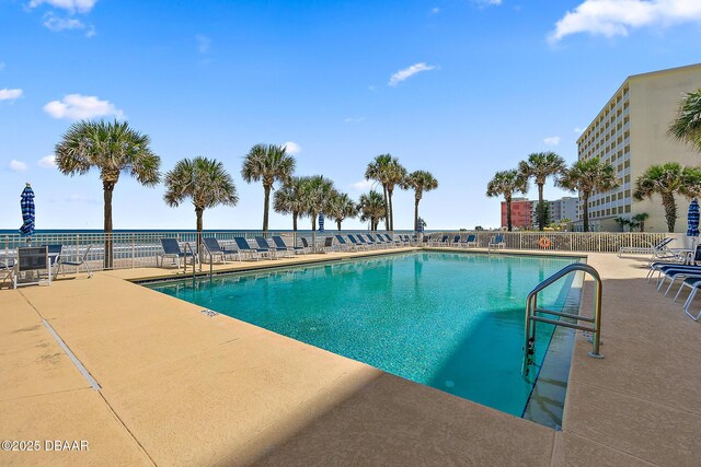 3145 S Atlantic Ave Unit 504, Daytona Beach Shores, FL 32118 - community pool with a patio area