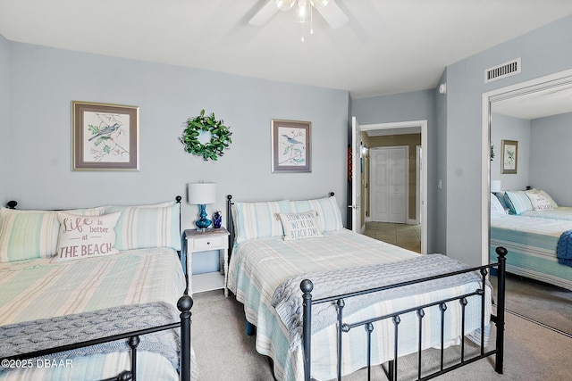 3145 S Atlantic Ave Unit 504, Daytona Beach Shores, FL 32118 - carpeted bedroom featuring a ceiling fan