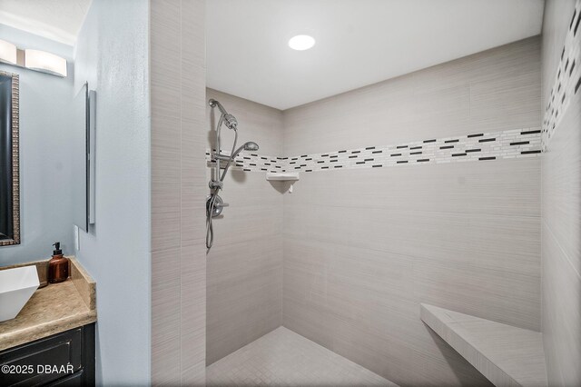 3145 S Atlantic Ave Unit 504, Daytona Beach Shores, FL 32118 - bathroom with a tile shower and vanity