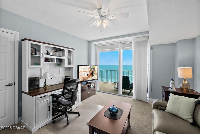 3145 S Atlantic Ave Unit 504, Daytona Beach Shores, FL 32118 - office area with ceiling fan, light colored carpet, and built in study area