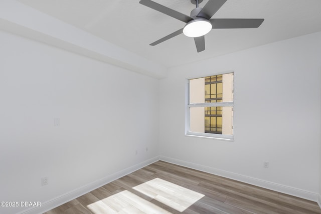 unfurnished room featuring ceiling fan and light wood-type flooring