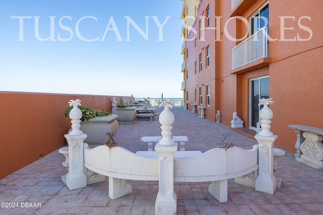 view of patio / terrace featuring a water view