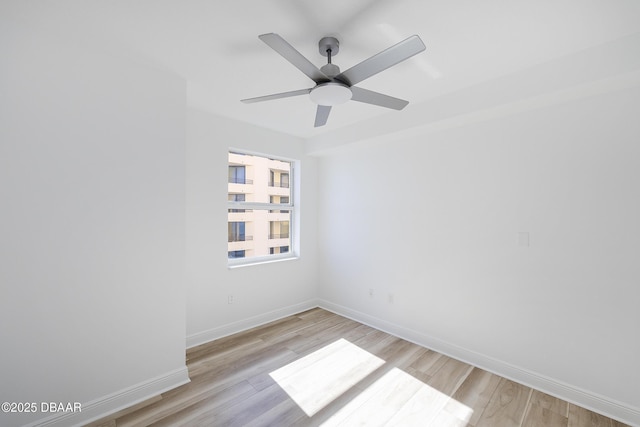 unfurnished room with light hardwood / wood-style flooring and ceiling fan