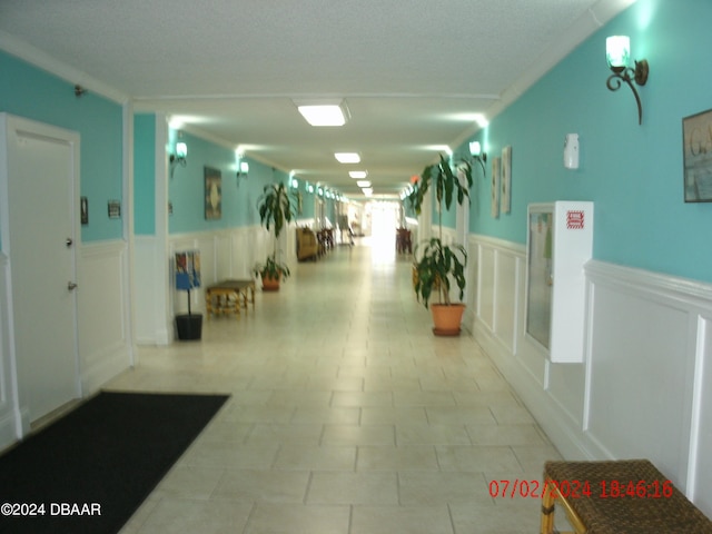 corridor with crown molding