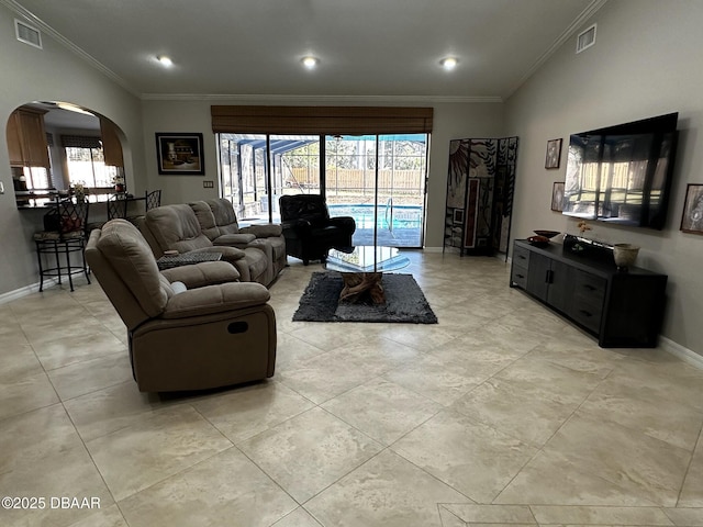 living room with ornamental molding