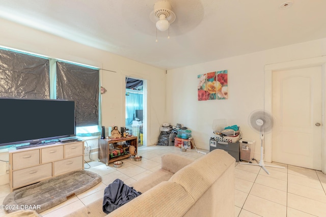 living room featuring ceiling fan and light tile patterned flooring