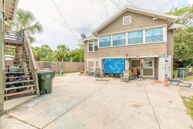 back of house with a patio area