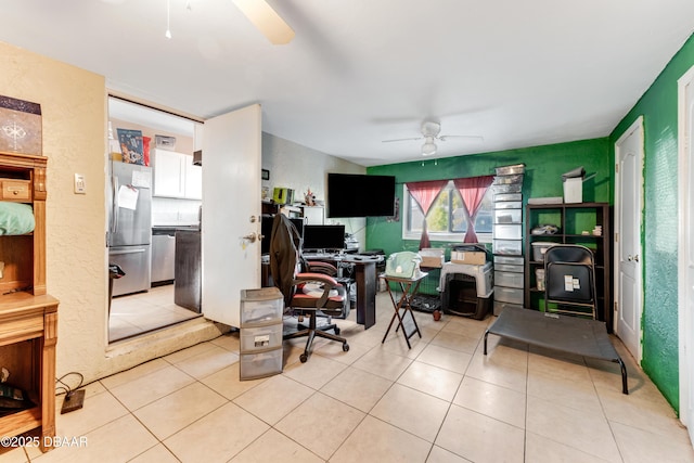 office featuring ceiling fan and light tile patterned floors