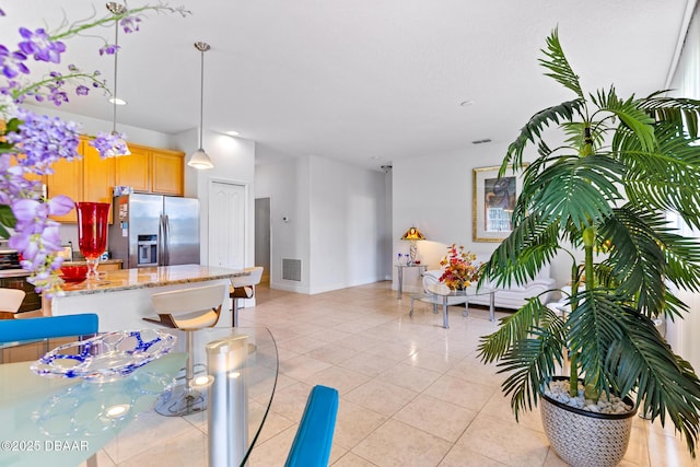 1248 Girog Ave, Port Orange, FL 32129 - dining room with light tile patterned floors and baseboards