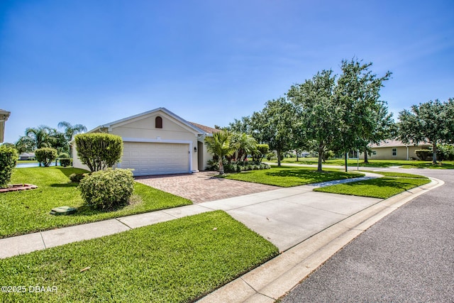 1248 Girog Ave, Port Orange, FL 32129 - view of front facade with decorative driveway, a front lawn, an attached garage, and stucco siding
