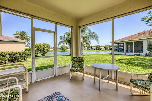 1248 Girog Ave, Port Orange, FL 32129 - sunroom / solarium featuring a water view