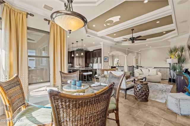330 Harbor Village Pt N, Palm Coast, FL 32137 - dining room featuring beam ceiling, visible vents, coffered ceiling, ceiling fan, and crown molding