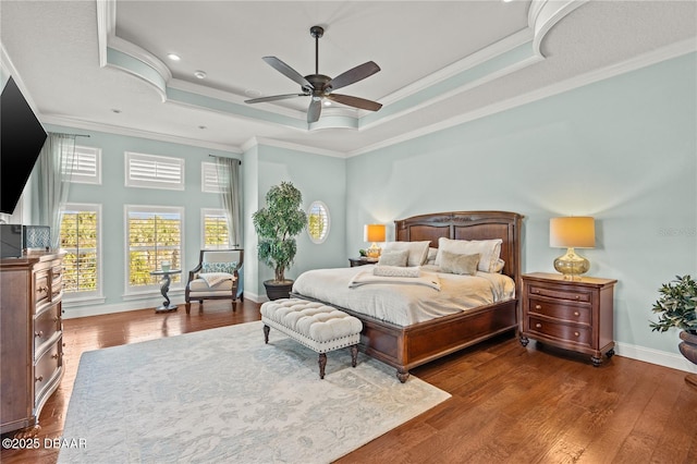 330 Harbor Village Pt N, Palm Coast, FL 32137 - bedroom featuring recessed lighting, a tray ceiling, wood finished floors, ornamental molding, and baseboards