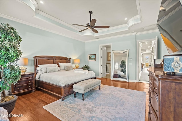 330 Harbor Village Pt N, Palm Coast, FL 32137 - bedroom with wood finished floors, a raised ceiling, and crown molding