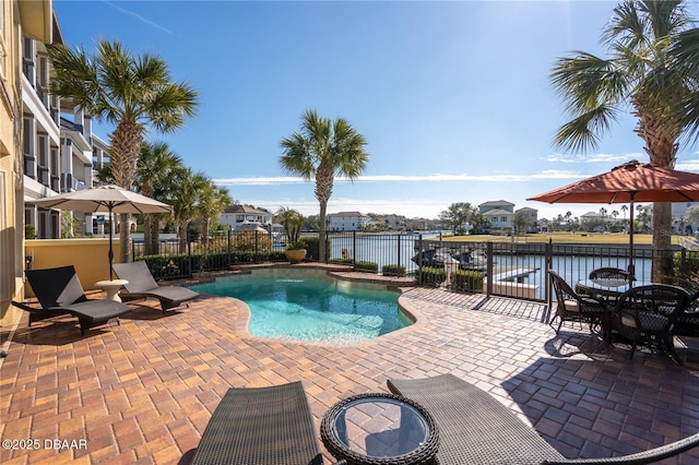 330 Harbor Village Pt N, Palm Coast, FL 32137 - view of pool with fence, a patio, a fenced in pool, and a water view