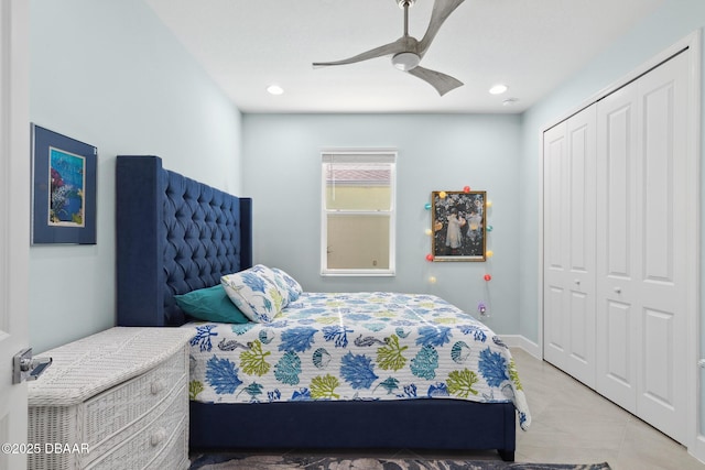 bedroom with ceiling fan and a closet