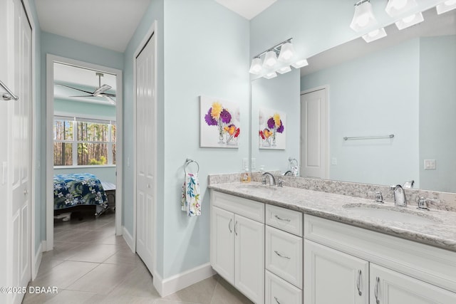 bathroom featuring vanity and tile patterned flooring