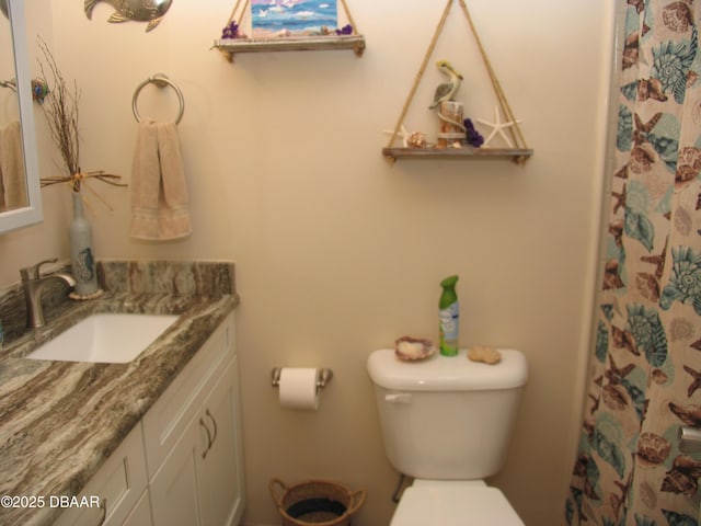 39 Benjamin Dr, Ormond Beach, FL 32176 - full bath featuring vanity, toilet, and a shower with shower curtain