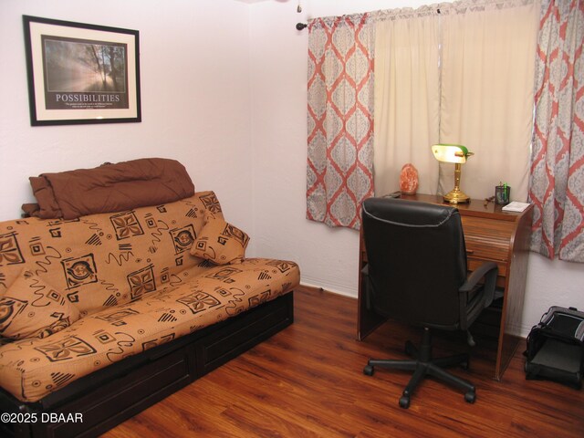 39 Benjamin Dr, Ormond Beach, FL 32176 - office area featuring dark wood-style floors and baseboards