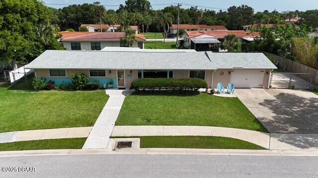 39 Benjamin Dr, Ormond Beach, FL 32176 - view of front facade featuring concrete driveway and a garage