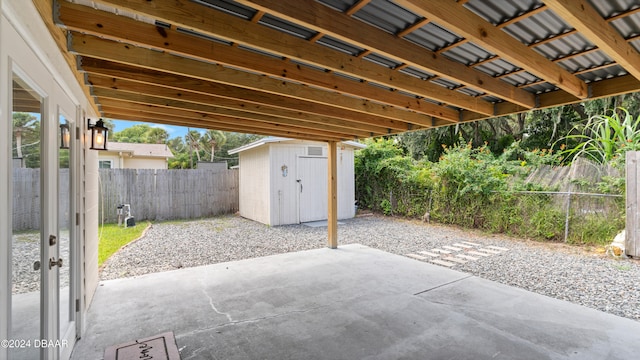 view of patio / terrace featuring a storage shed