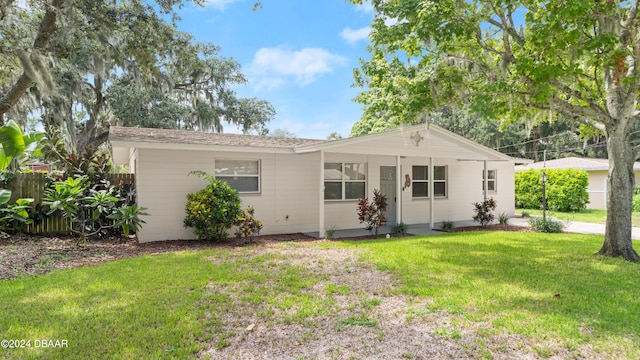 view of front of home with a front yard