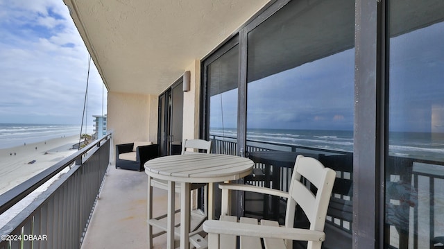 4139 S Atlantic Ave Unit A406, New Smyrna Beach, FL 32169 - balcony with view of water and beach